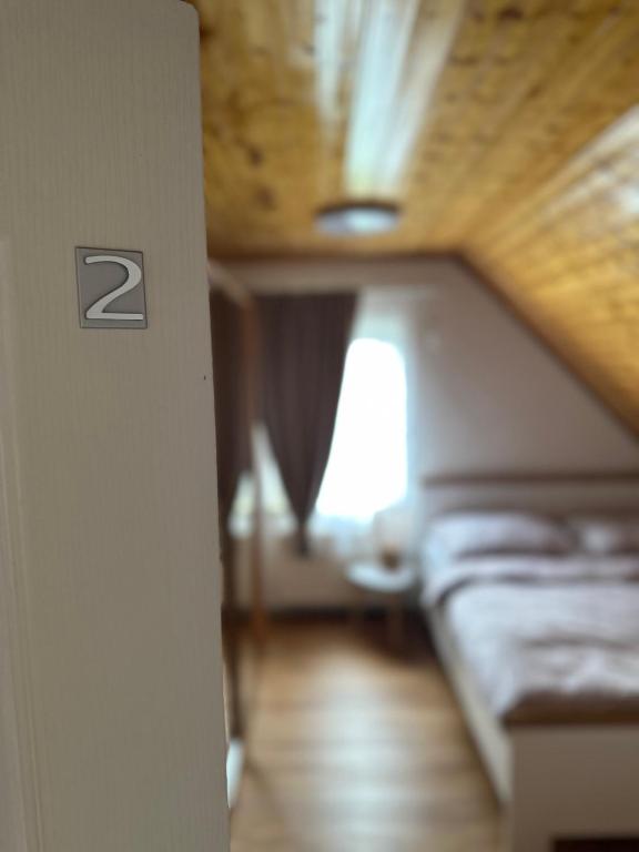 Postel nebo postele na pokoji v ubytování Apartmán Jako u Babičky