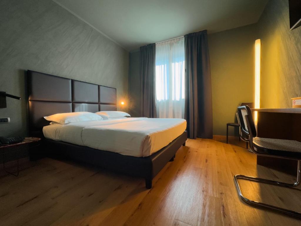Postel nebo postele na pokoji v ubytování Point Hotel
