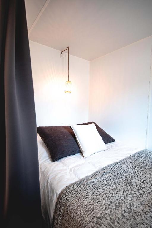 Letto o letti in una camera di Camping Familial - Parc Aquatique - Grande Aire de Jeux à la Montagne
