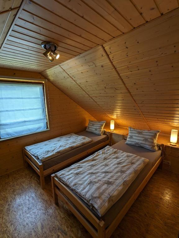 Postel nebo postele na pokoji v ubytování Ferienwohnung Abendschein