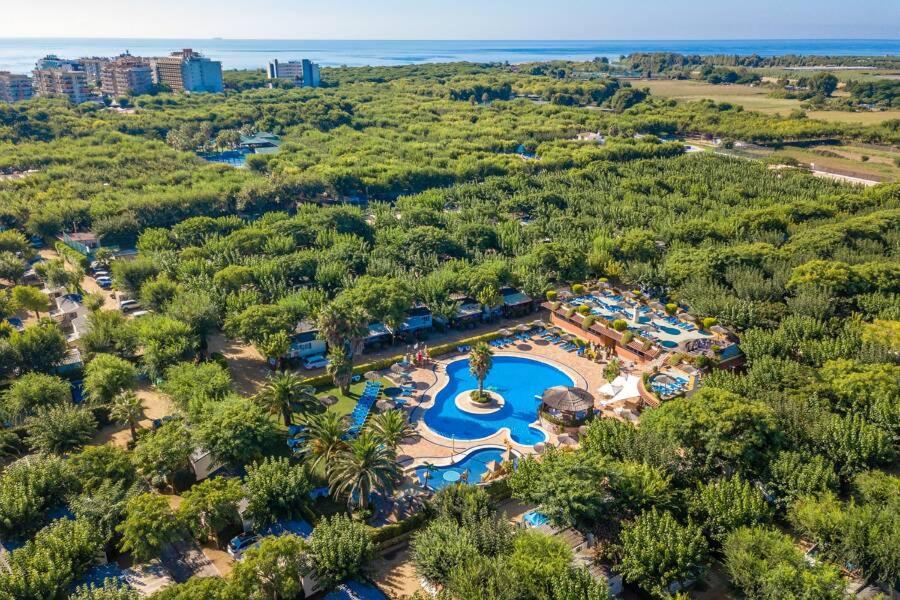 an overhead view of a resort with a swimming pool at Camping La Masia - Maeva Vacansoleil in Blanes