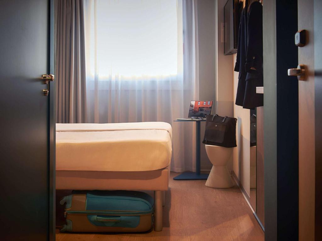 Postel nebo postele na pokoji v ubytování Ibis budget Vitoria Gasteiz