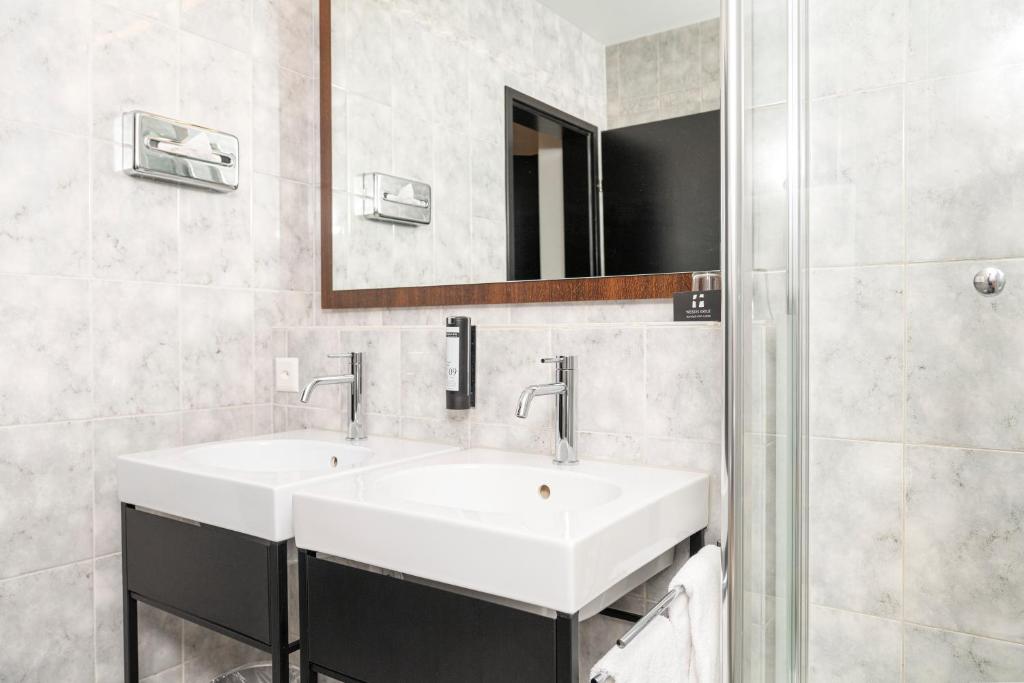 Koupelna v ubytování Boutique Hotel Weisses Kreuz - Adult only Hotel