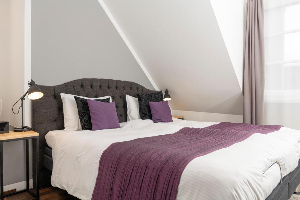 Postel nebo postele na pokoji v ubytování Boutique Hotel Weisses Kreuz - Adult only Hotel