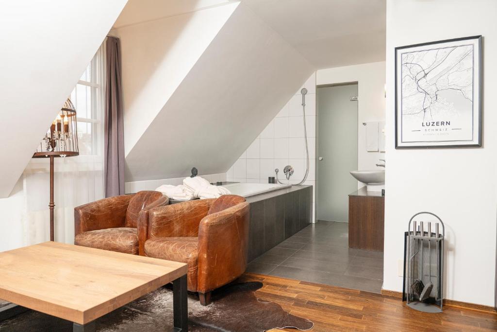 Postel nebo postele na pokoji v ubytování Boutique Hotel Weisses Kreuz - Adult only Hotel