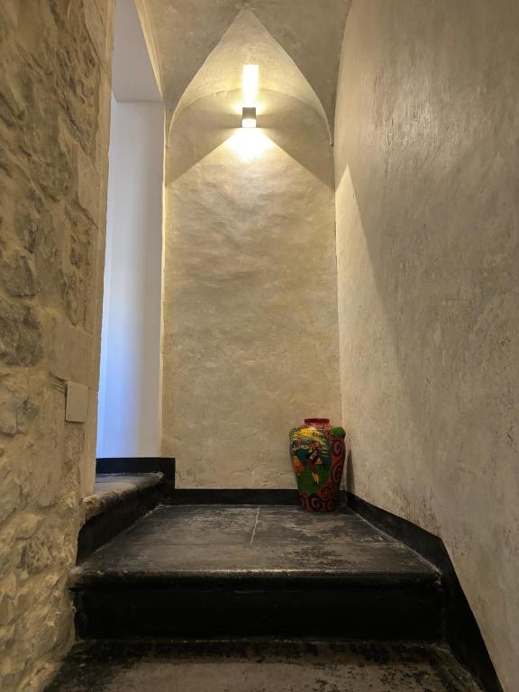 Postel nebo postele na pokoji v ubytování L' Antico Borgo Ibla