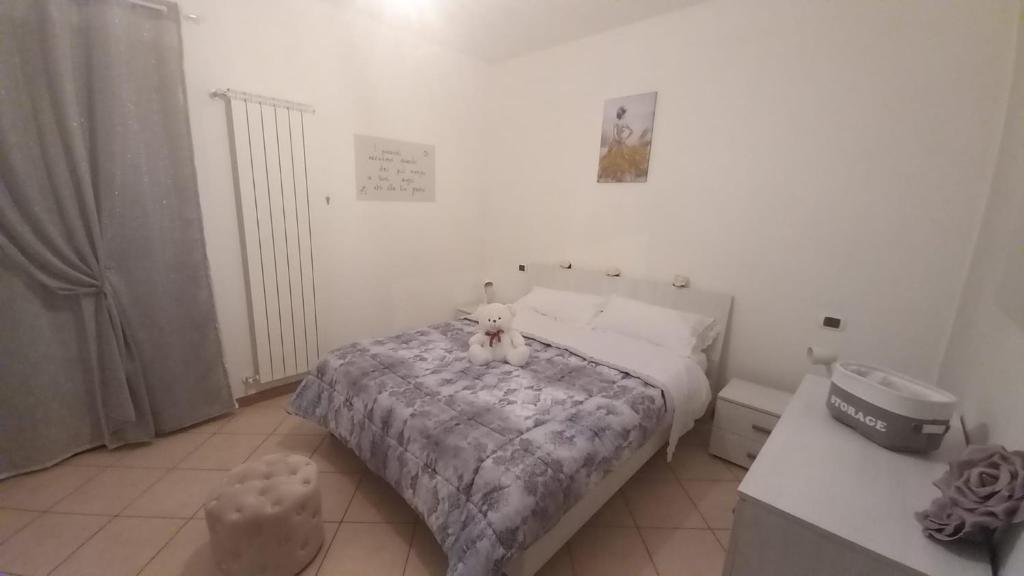Postel nebo postele na pokoji v ubytování I 4 bimbi
