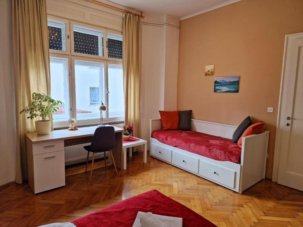 Postel nebo postele na pokoji v ubytování B&B Vila Teslova
