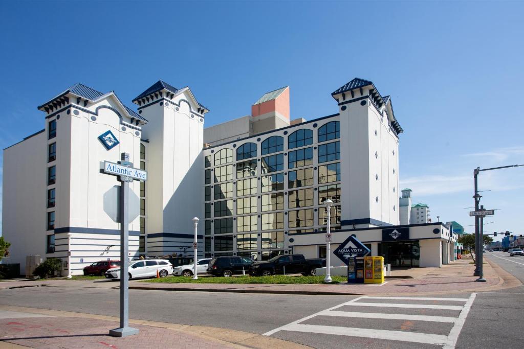 a street sign in front of a large building at Aqua Vista Resort Hotel in Virginia Beach