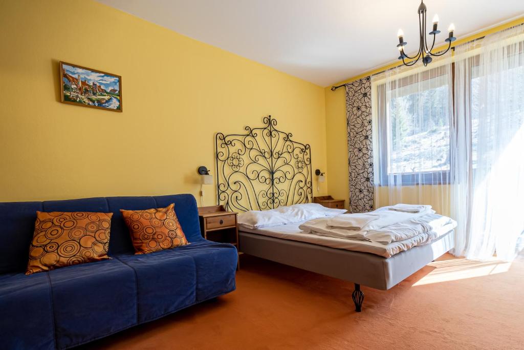 Postel nebo postele na pokoji v ubytování Fatrapark 2 Apartments House