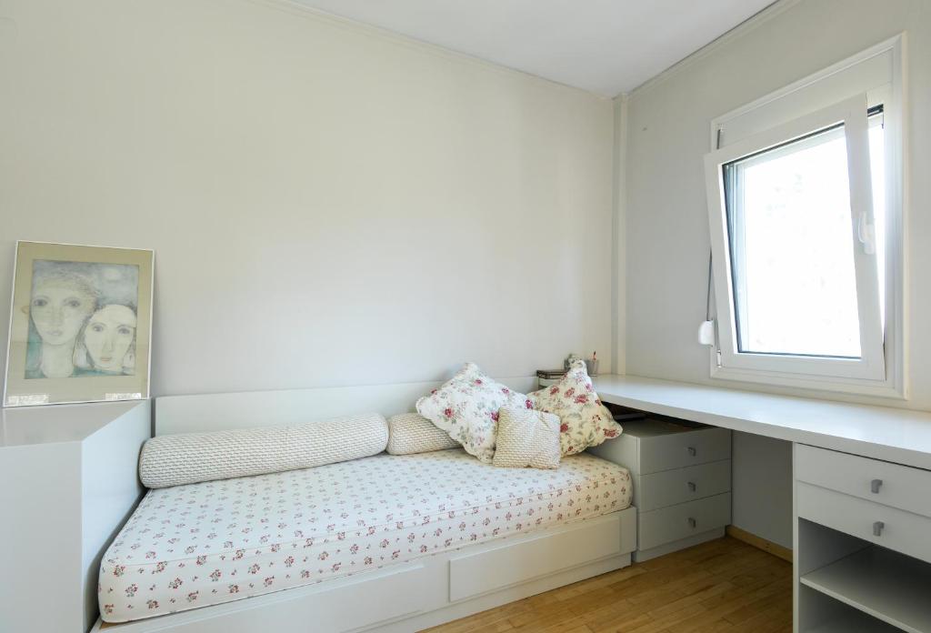 Postel nebo postele na pokoji v ubytování Recon Villa Paliouri