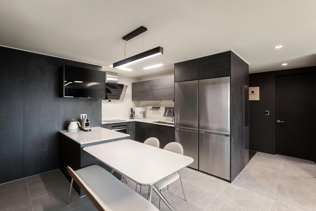 Kuchyň nebo kuchyňský kout v ubytování NewCZ Osiria Residence