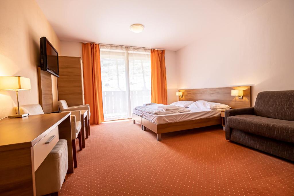 Postel nebo postele na pokoji v ubytování Fatrapark 2 Apartments House