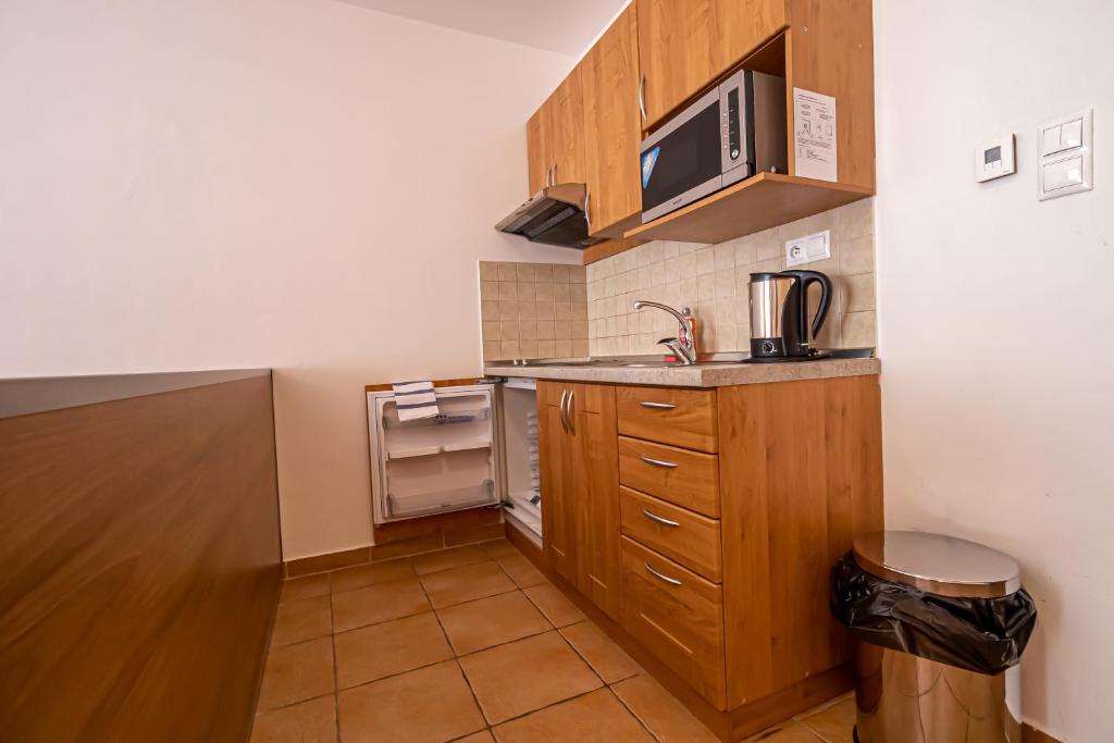 Kuchyň nebo kuchyňský kout v ubytování Fatrapark 2 Apartments House