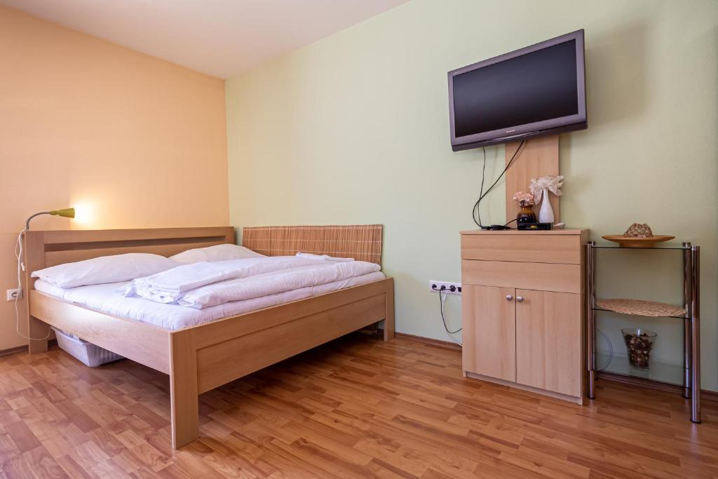 Postel nebo postele na pokoji v ubytování Fatrapark 2 Apartments House