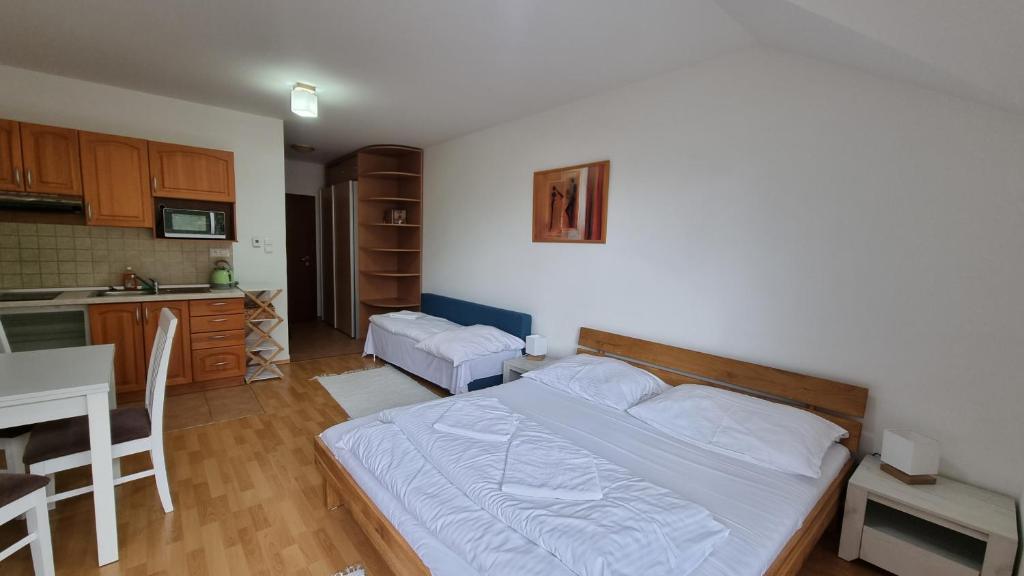 Postel nebo postele na pokoji v ubytování Fatrapark 2 Apartments House