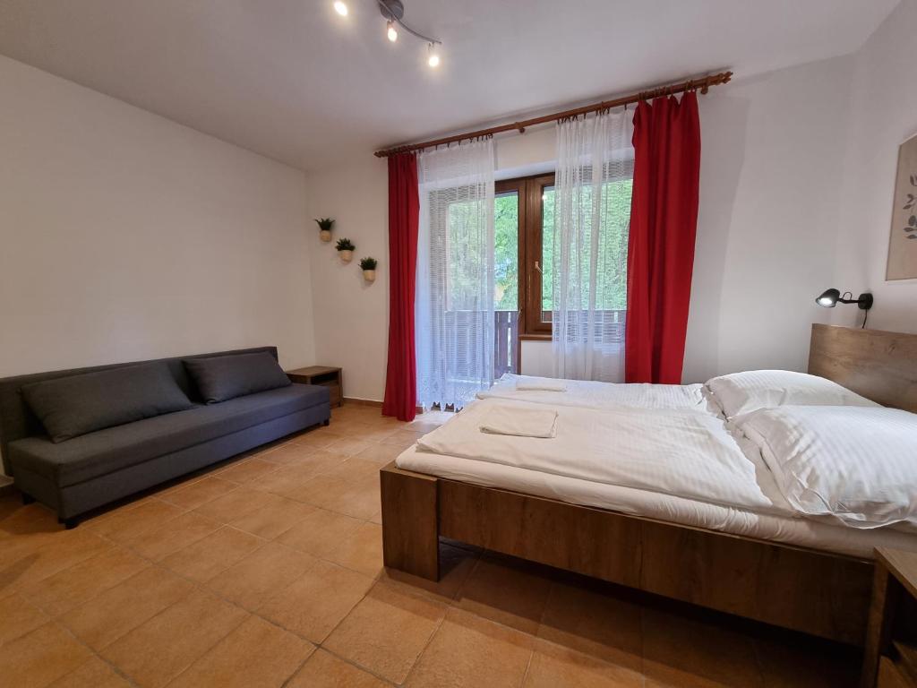 Postel nebo postele na pokoji v ubytování Fatrapark 2 Apartments House