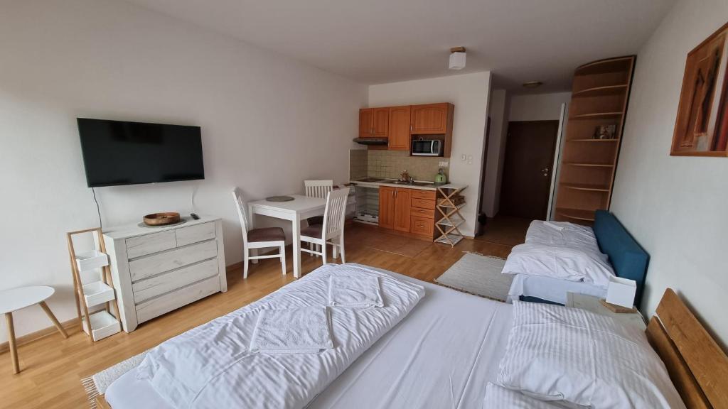 Postel nebo postele na pokoji v ubytování Fatrapark 2 Apartments House