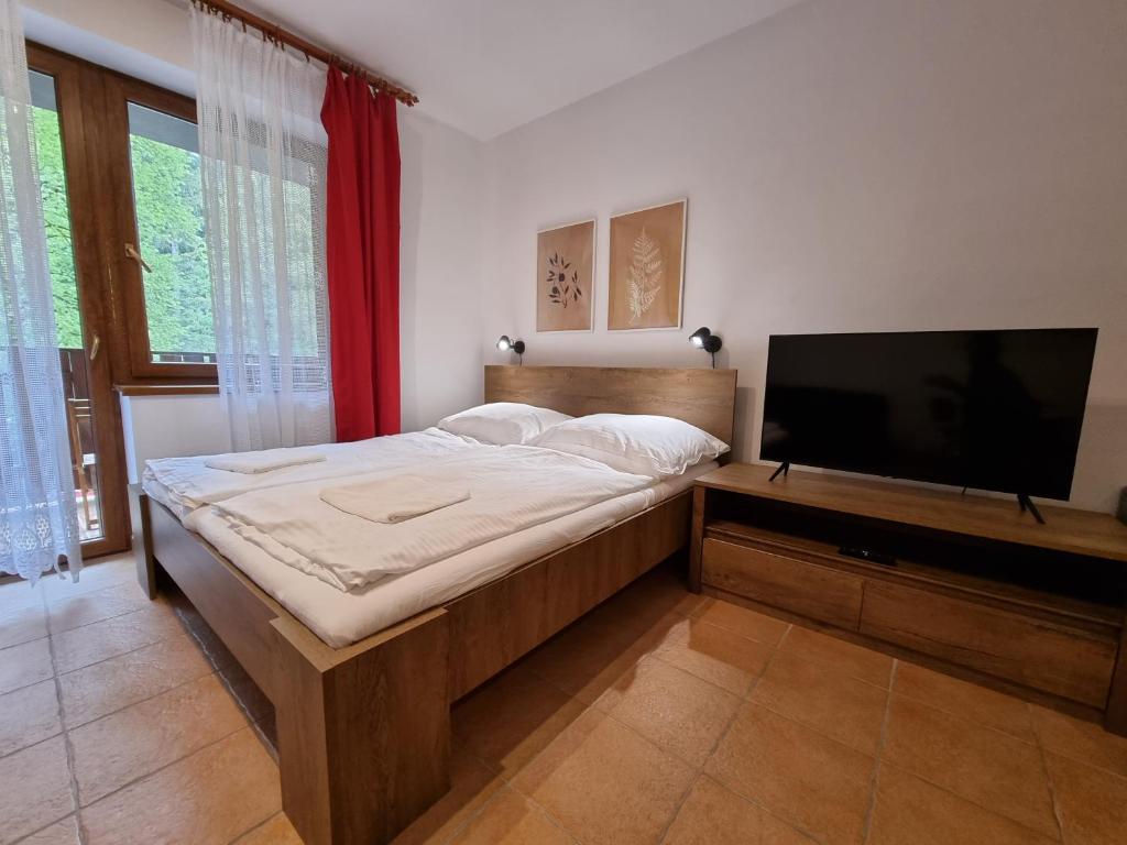 Postel nebo postele na pokoji v ubytování Fatrapark 2 Apartments House