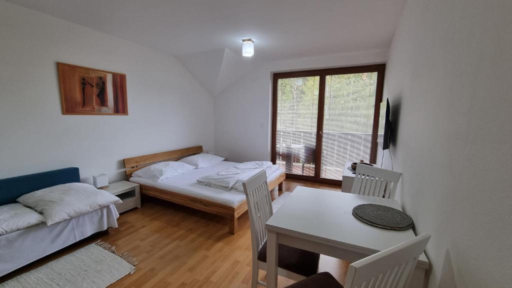 Postel nebo postele na pokoji v ubytování Fatrapark 2 Apartments House