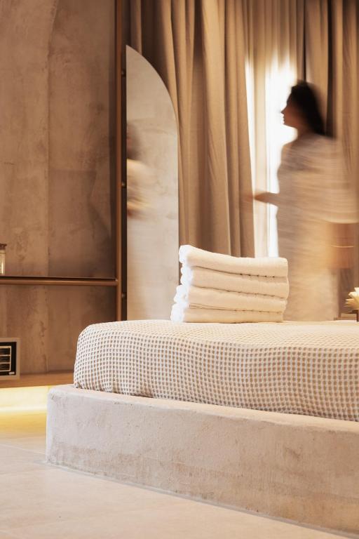 Łóżko lub łóżka w pokoju w obiekcie Medusa Luxury Suites