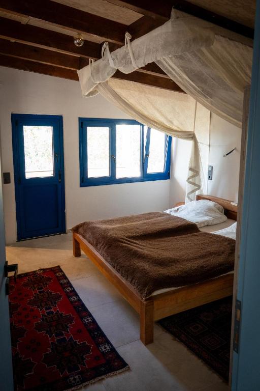 Postel nebo postele na pokoji v ubytování Ferienhaus Asterousia