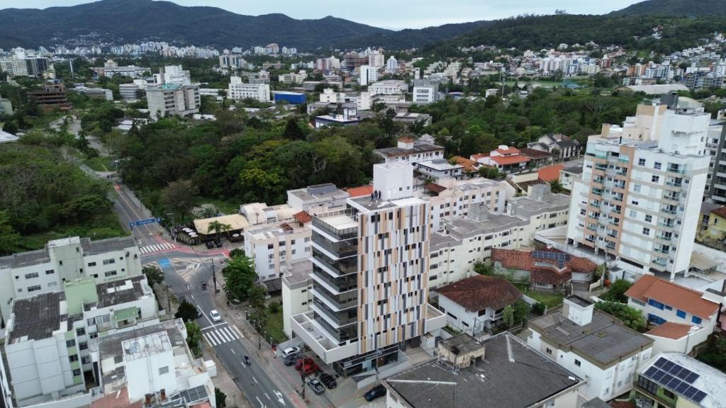 an aerial view of a city with buildings at Uniquo Residence in Florianópolis
