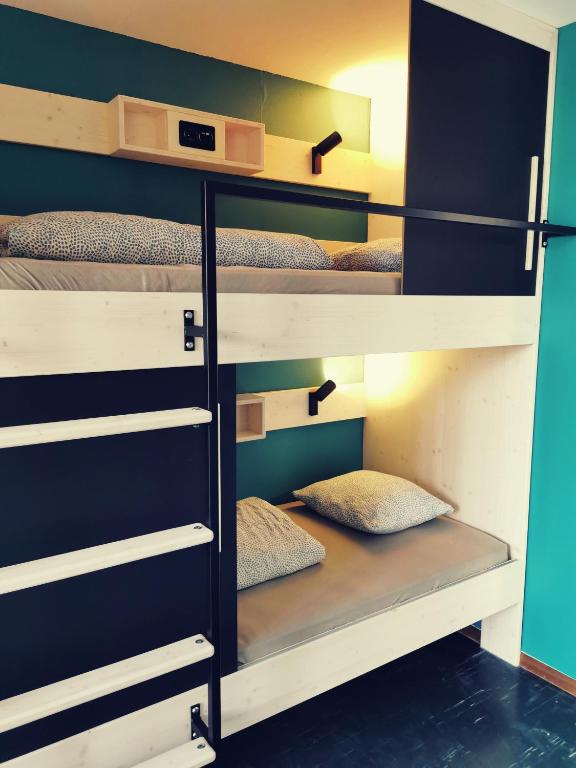 Postel nebo postele na pokoji v ubytování Backpackers Luzern