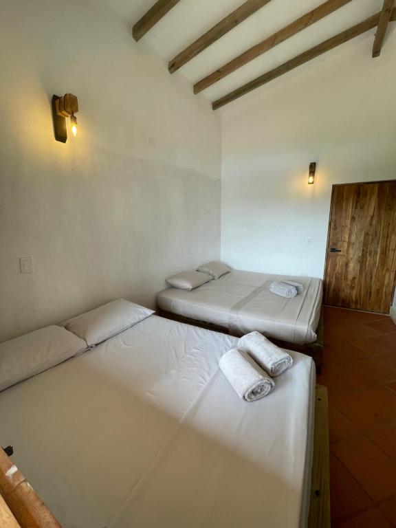 Postel nebo postele na pokoji v ubytování Finca Hotel el Valhalla
