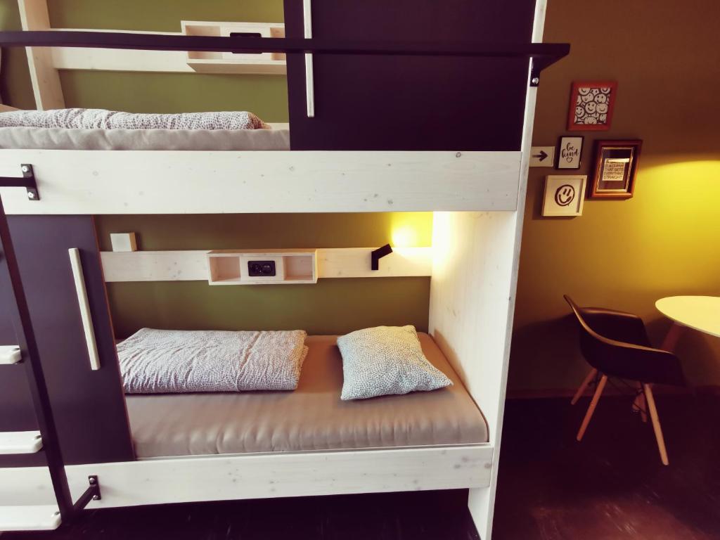 
Single Bed in 2-Bed Male Dormitory Room with Shared Bathroom
