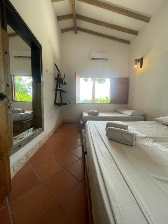 Postel nebo postele na pokoji v ubytování Finca Hotel el Valhalla