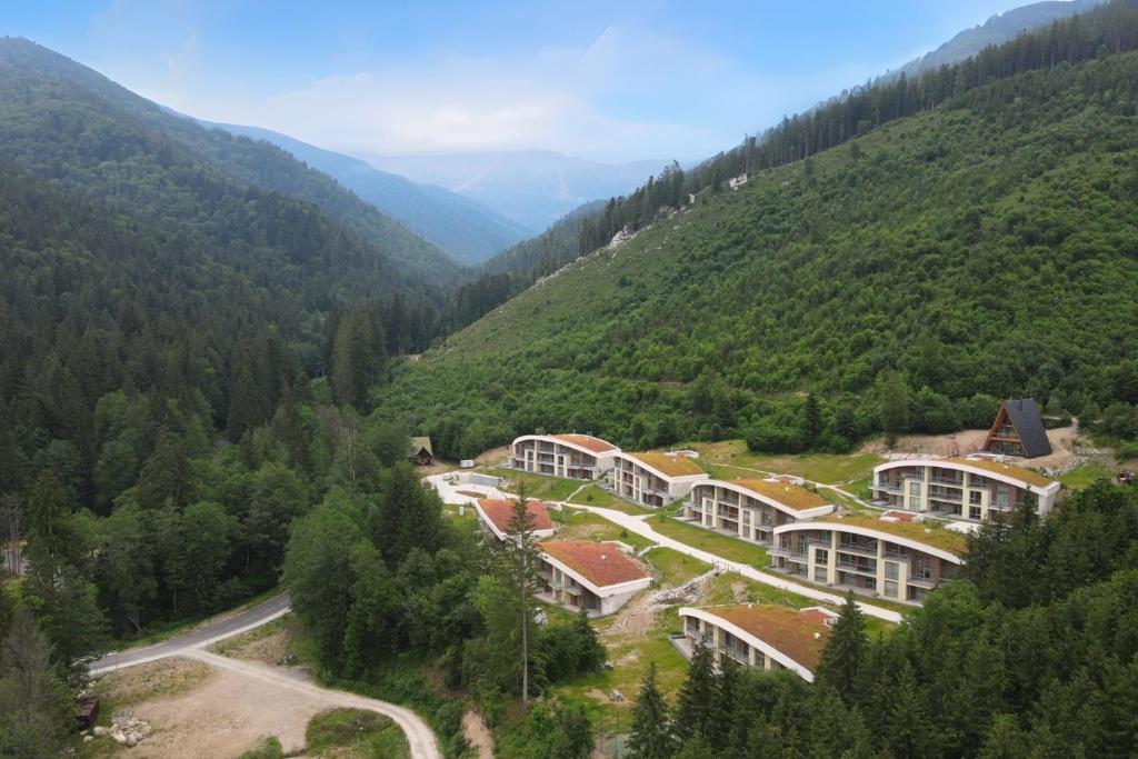 an aerial view of a resort in the mountains at TALBERG SK - Garage parking - Quiet place - Brand new apartments - Tále in Tale