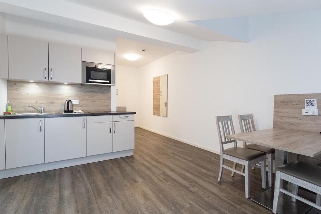 Kuchyň nebo kuchyňský kout v ubytování Aparthotel Oberfeld West München, Selbstversorgerhotel