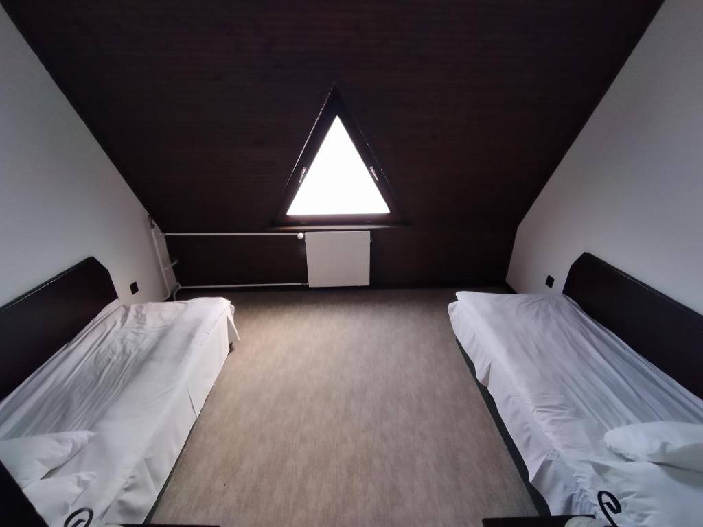 Voodi või voodid majutusasutuse Viking Hotel toas