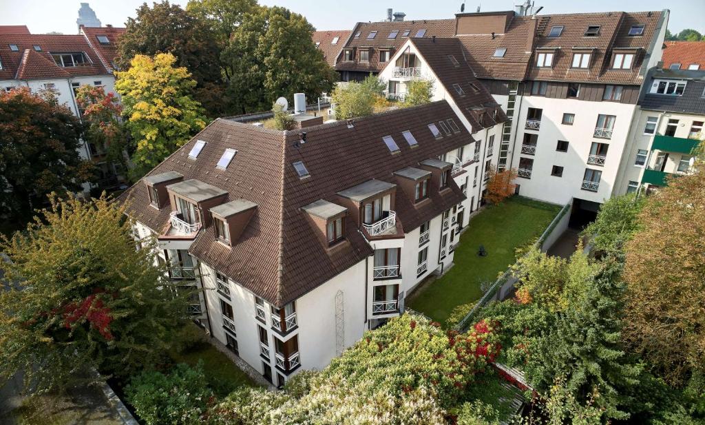 an aerial view of a house with a roof at Balance Hotel Leipzig Alte Messe in Leipzig
