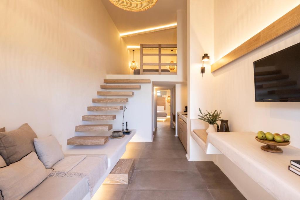 Posezení v ubytování Frescoes Luxury Suites By KB Hospitality