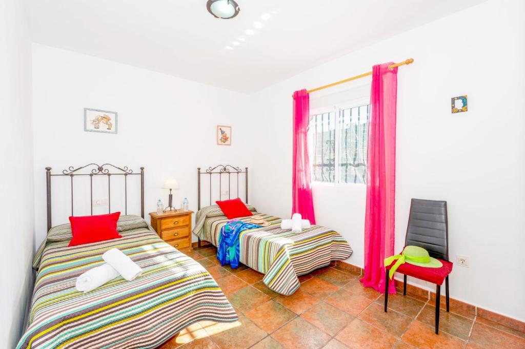 A bed or beds in a room at Villa Los Sanchez