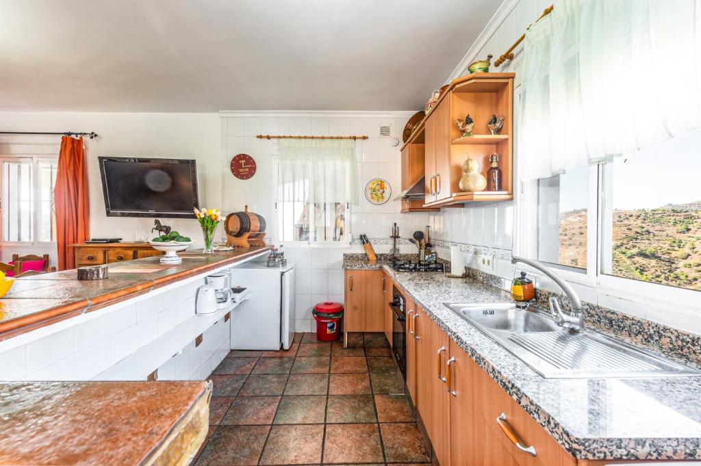 A kitchen or kitchenette at Villa Los Sanchez