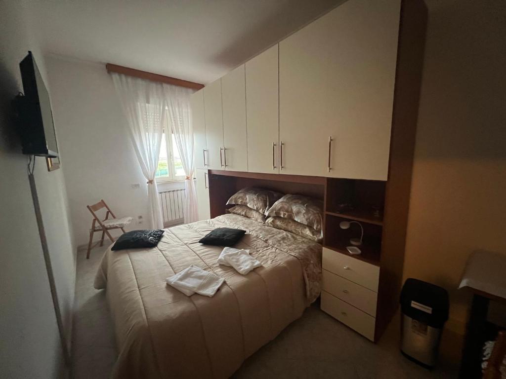 Postel nebo postele na pokoji v ubytování Alloggio turistico FRANCY HOME