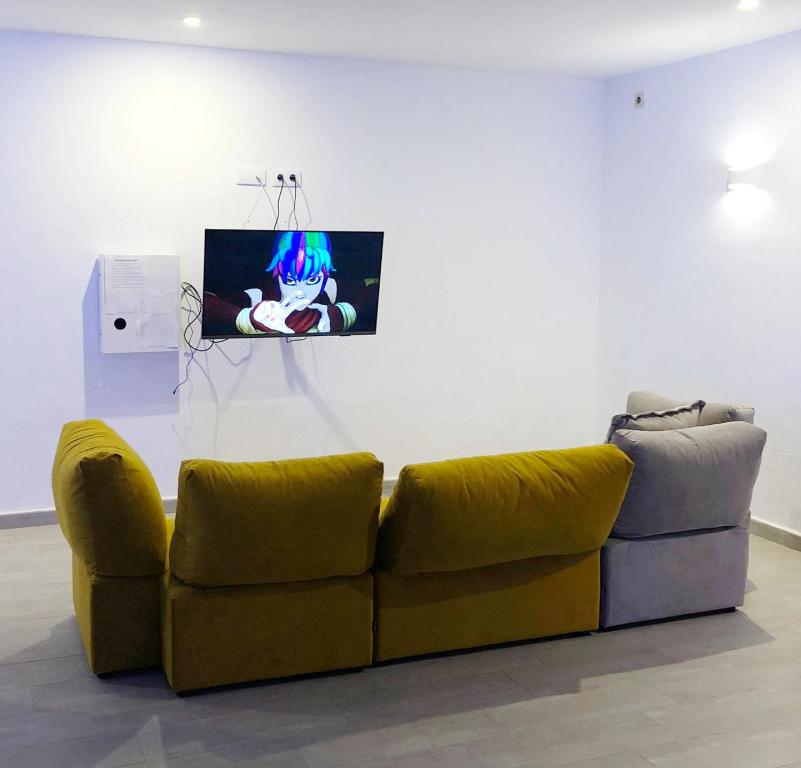 TV a/nebo společenská místnost v ubytování Hotel Porto