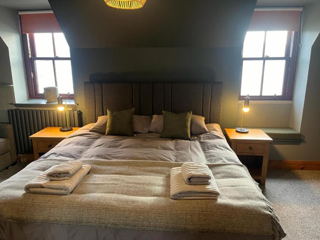 Postel nebo postele na pokoji v ubytování Stein Inn