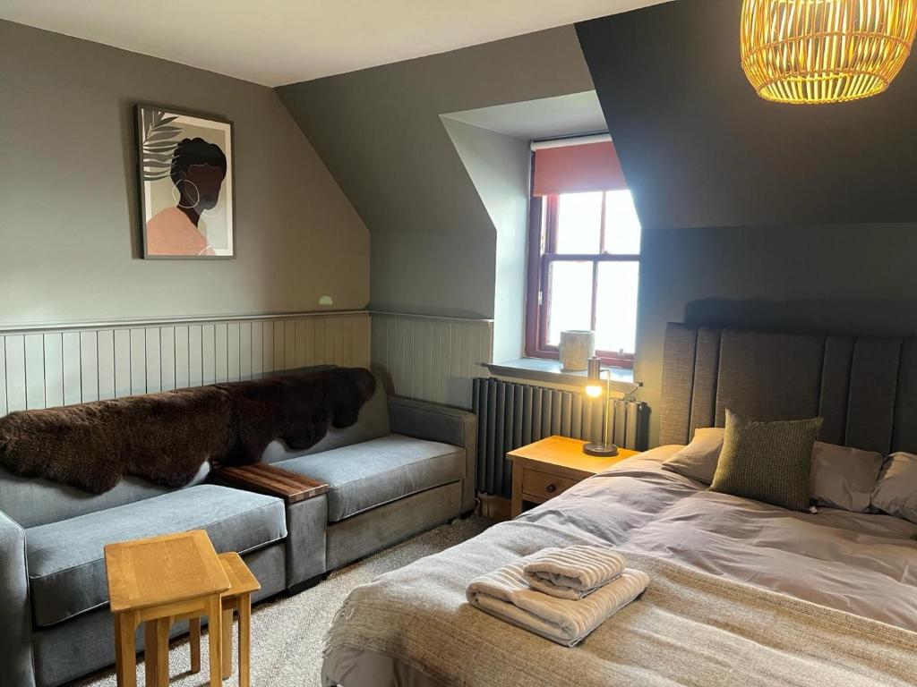 Postel nebo postele na pokoji v ubytování Stein Inn