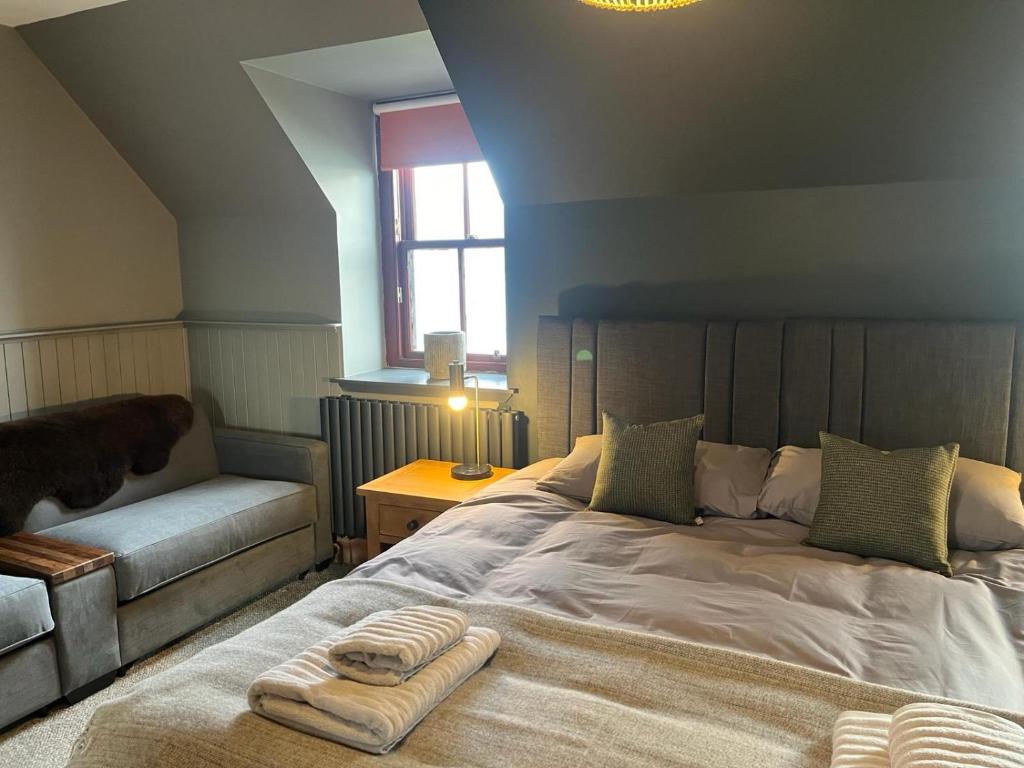 Postel nebo postele na pokoji v ubytování Stein Inn