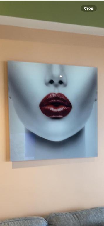 a picture of a white face with a red lips at Kornialle in Accra