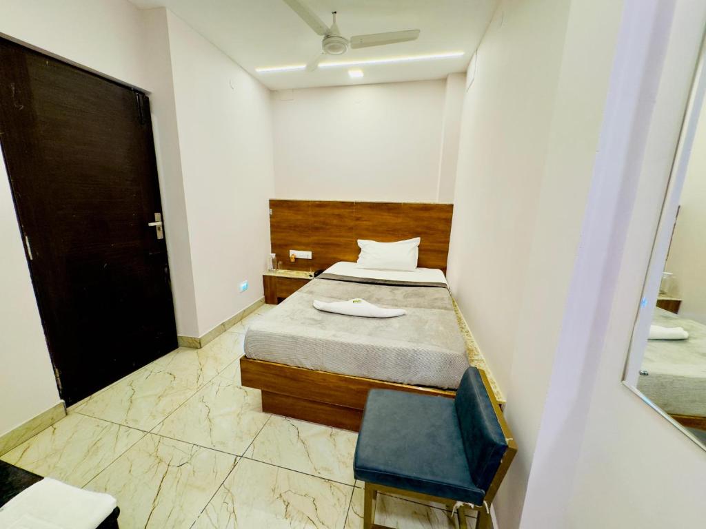 Postel nebo postele na pokoji v ubytování GREENS INN near Madras High Court and Harbour Chennai Port