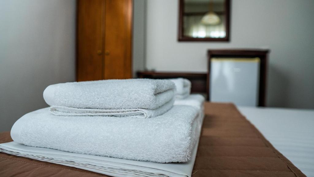 Posteľ alebo postele v izbe v ubytovaní Rooms Batalogianni