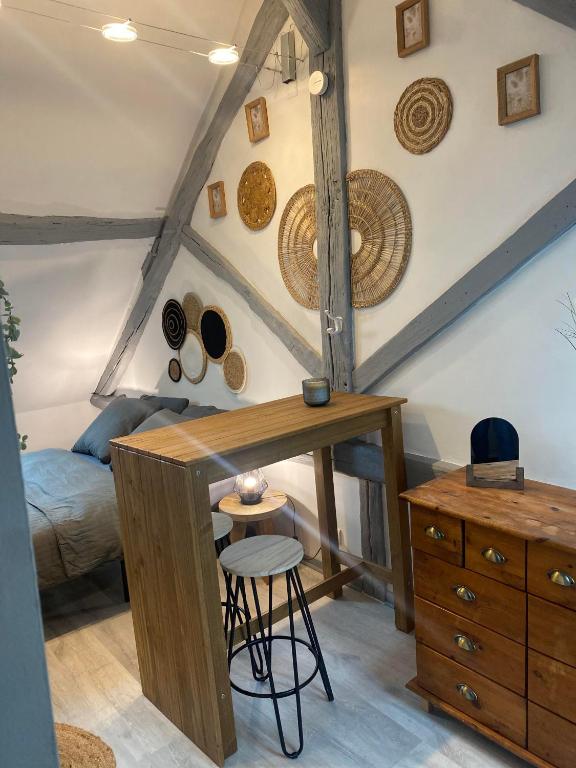 Postel nebo postele na pokoji v ubytování Appart hôtel Toucy 3