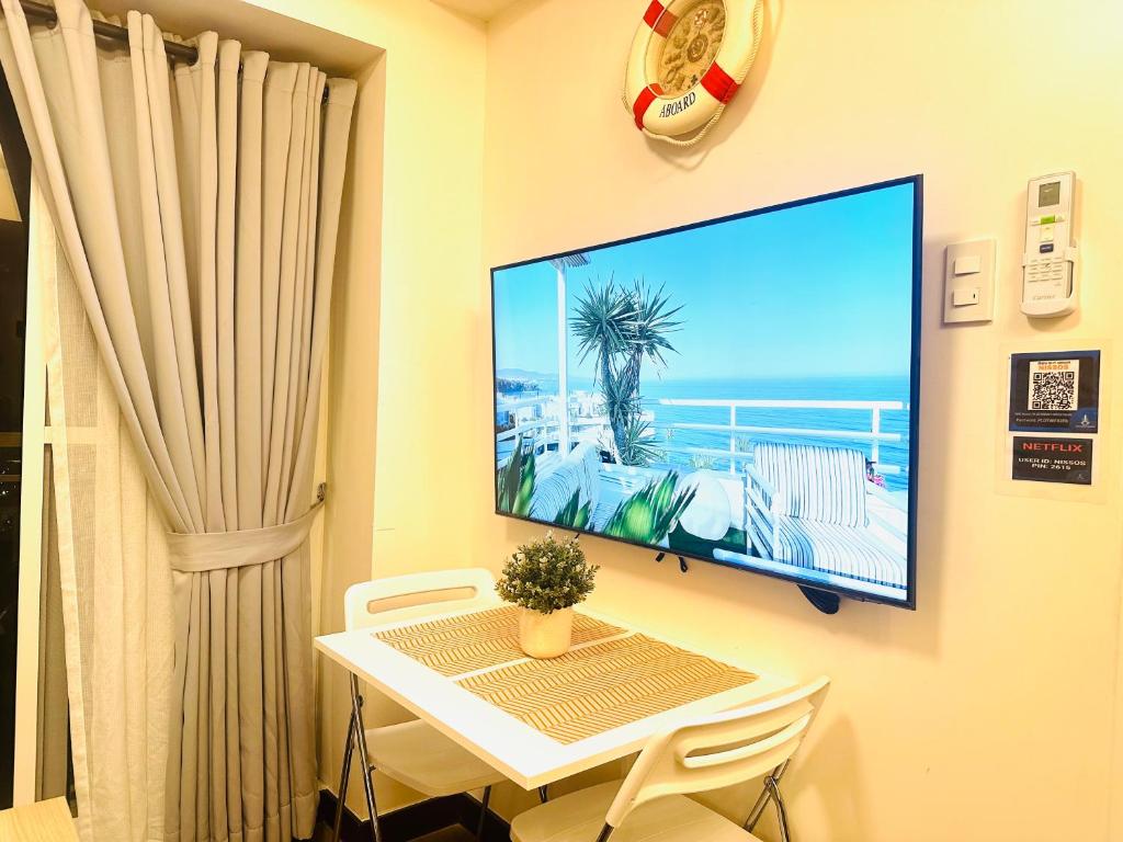 TV i/ili multimedijalni sistem u objektu CELANDINE Residence by DMCI