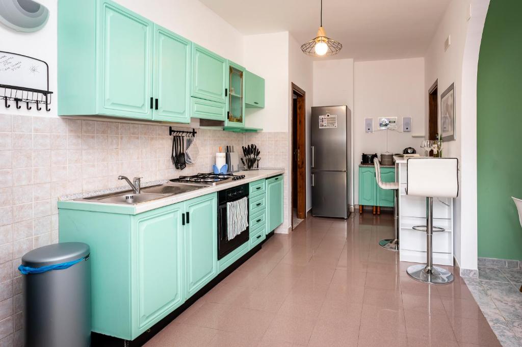 A kitchen or kitchenette at Casa Vacanze D'Urso