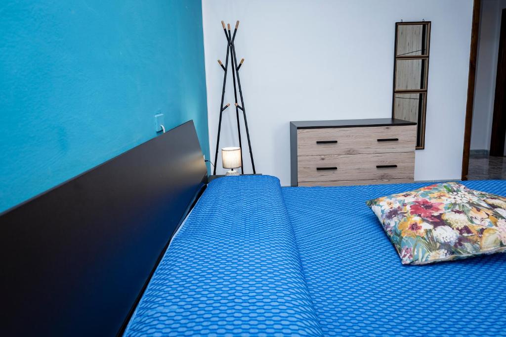 A bed or beds in a room at Casa Vacanze D'Urso